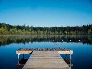 Night stay at peaceful lake fully surrounded by mountain